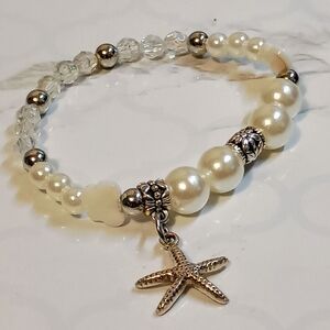 Elegant Pearl and Silver Starfish Bracelet